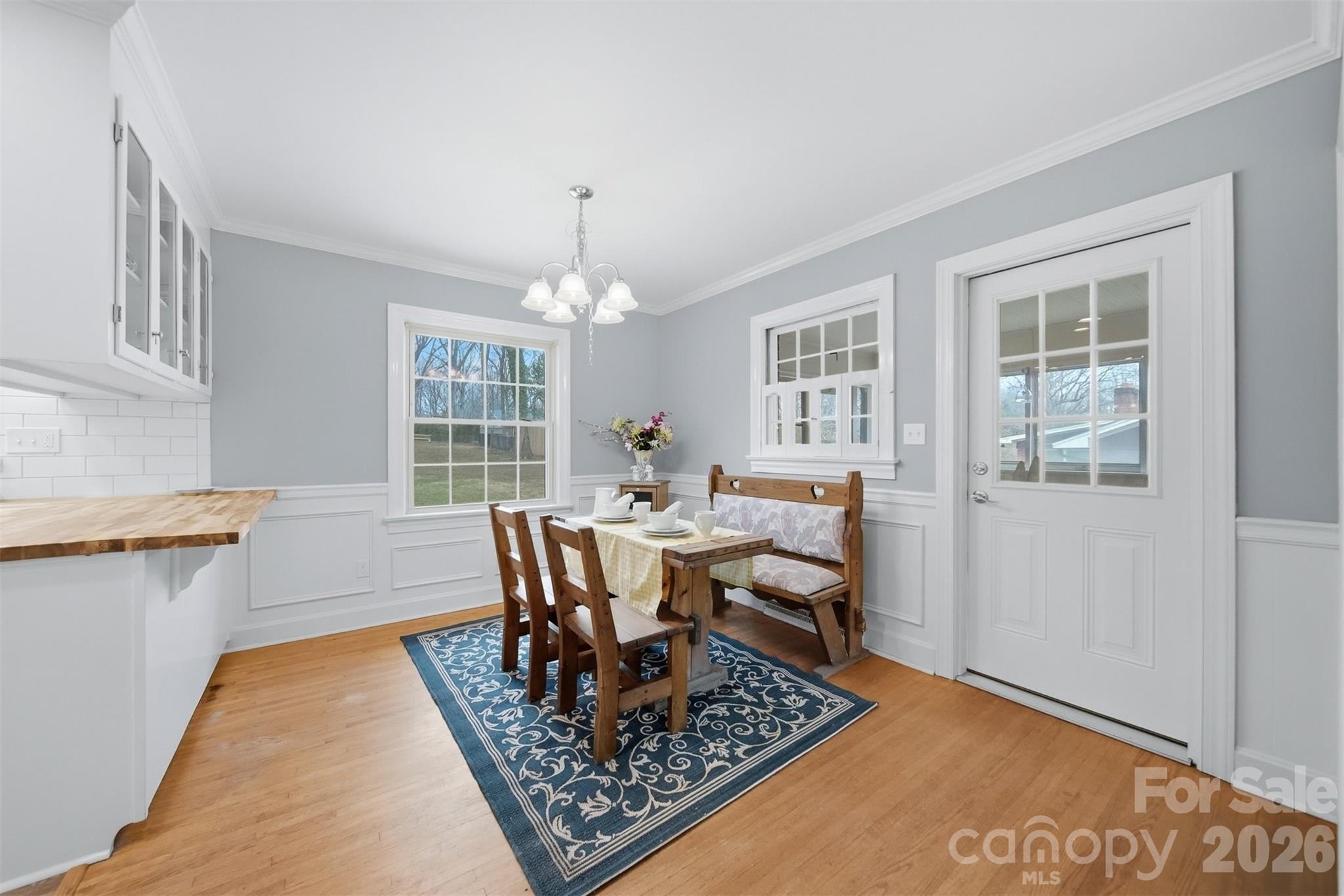 705 2nd Avenue Northeast Conover, NC 28613 - Photo 15 of 43 a living room with furniture a rug and a window
