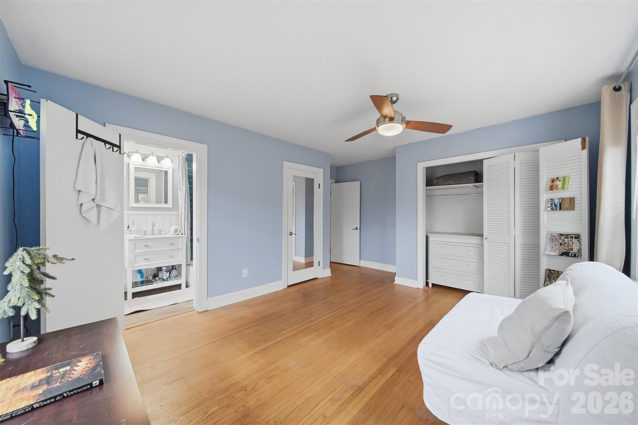 705 2nd Avenue Northeast Conover, NC 28613 - Photo 21 of 43 a bedroom with a bed and a couch