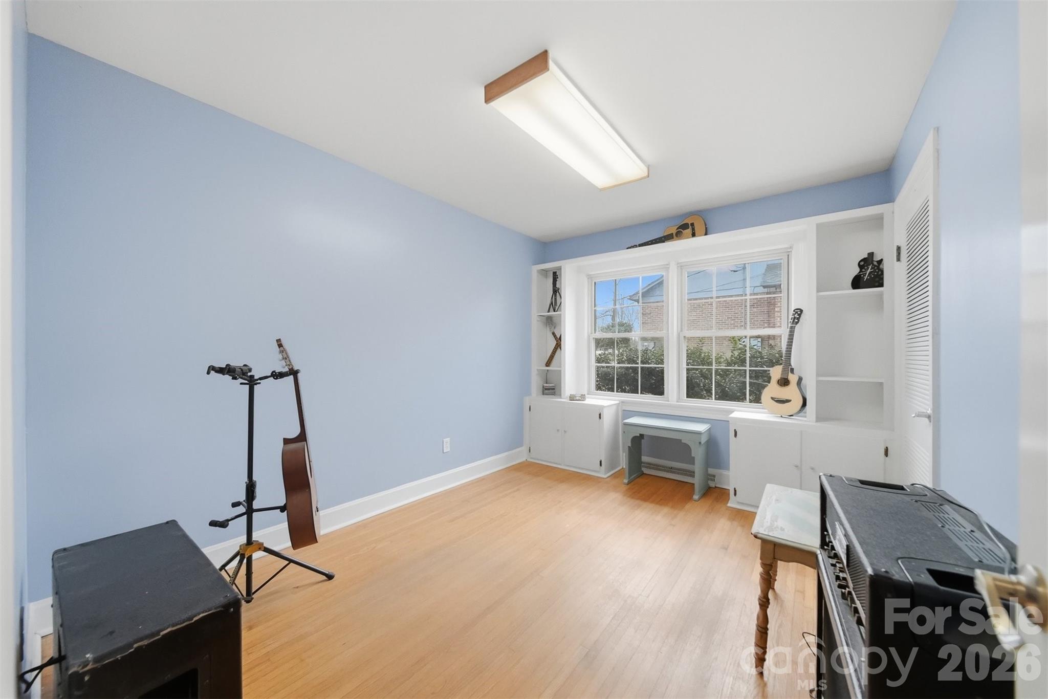 705 2nd Avenue Northeast Conover, NC 28613 - Photo 24 of 43 a work room with furniture and a window
