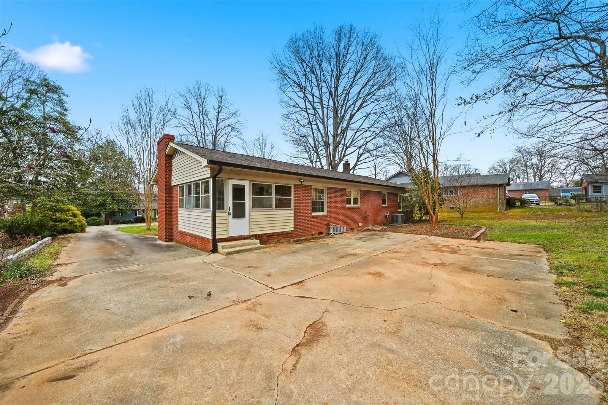 705 2nd Avenue Northeast Conover, NC 28613 - Photo 37 of 43 a front view of a house with a yard and garage