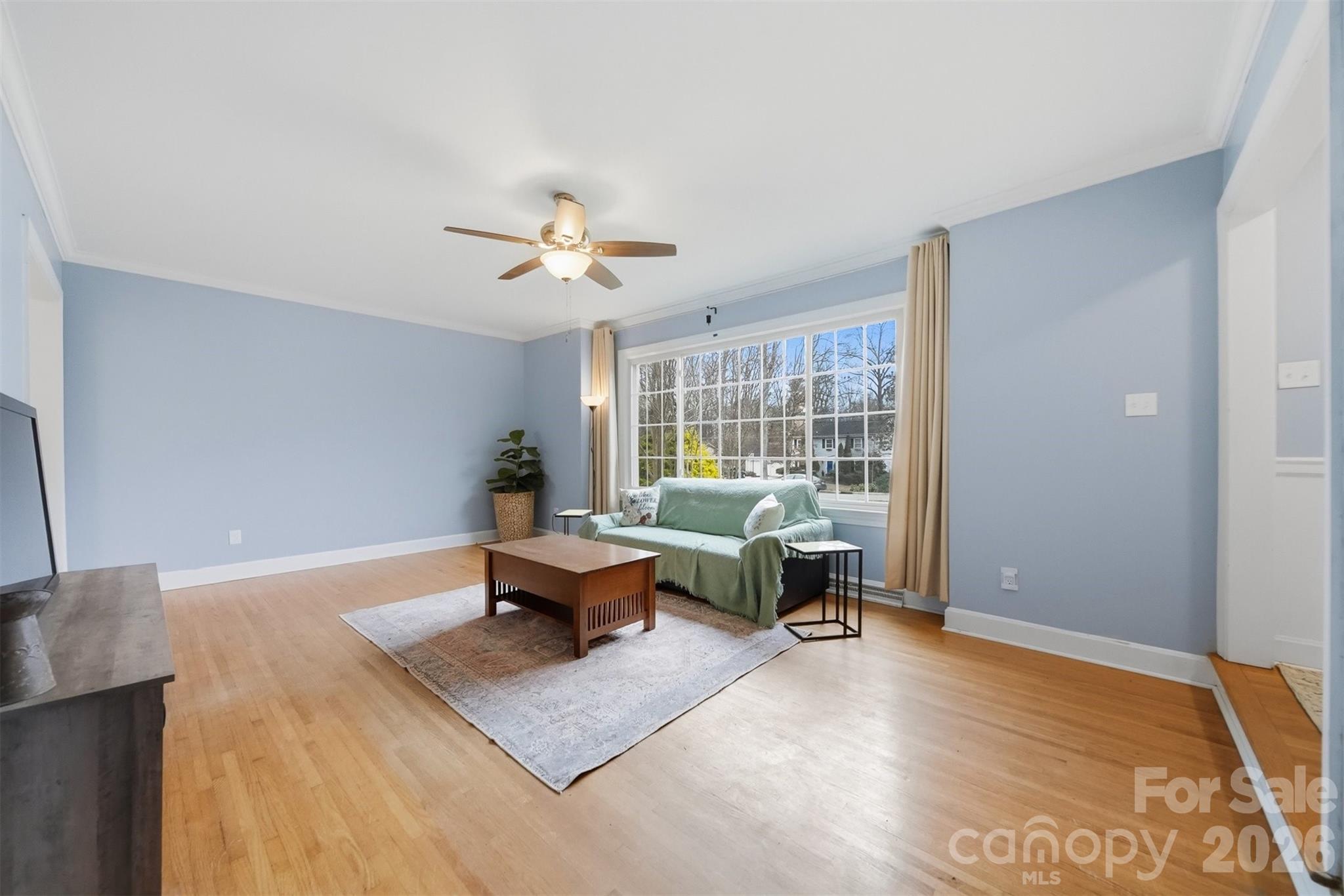 705 2nd Avenue Northeast Conover, NC 28613 - Photo 7 of 43 a living room with furniture rug and window