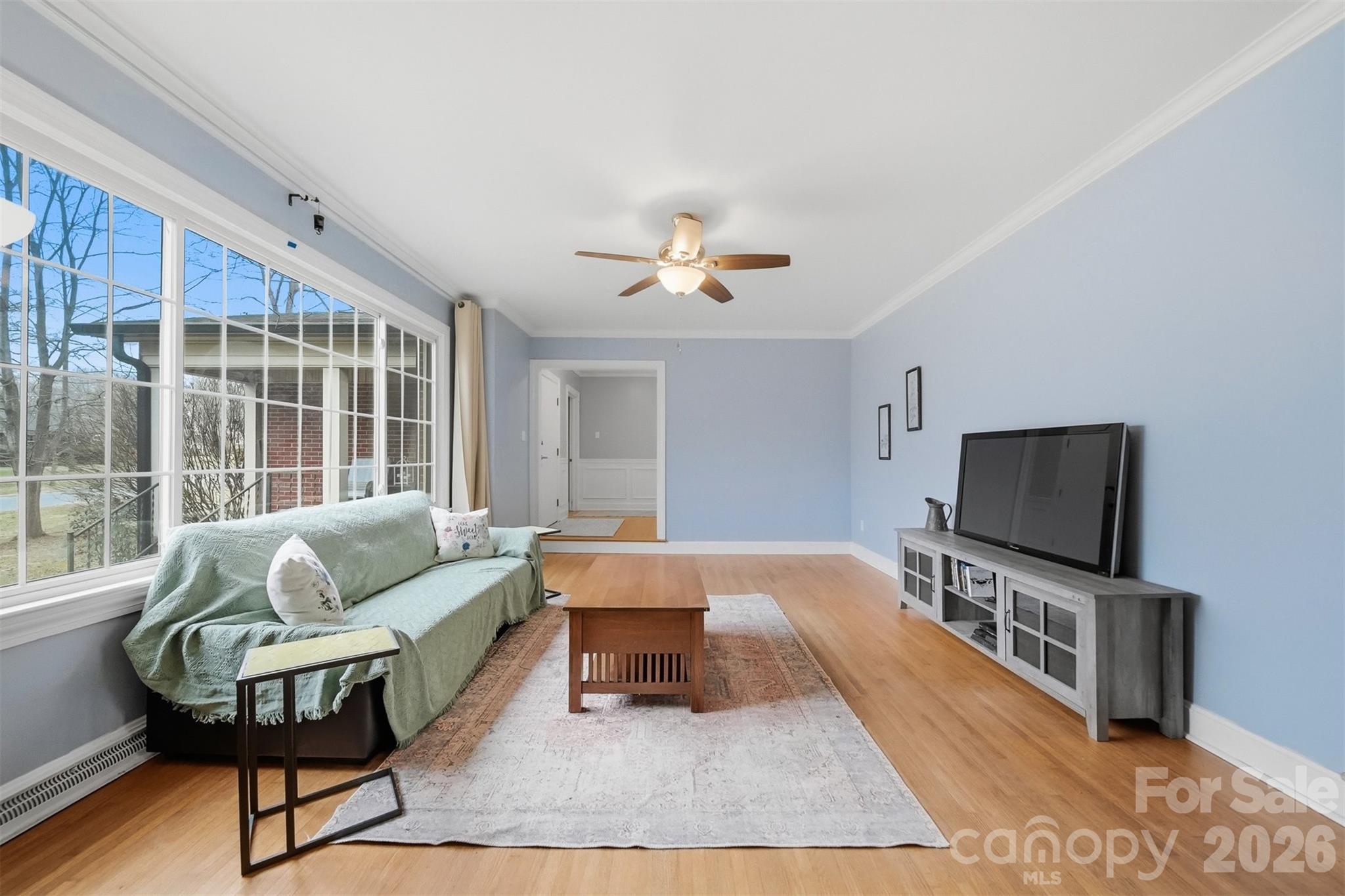 705 2nd Avenue Northeast Conover, NC 28613 - Photo 8 of 43 a living room with furniture and a flat screen tv