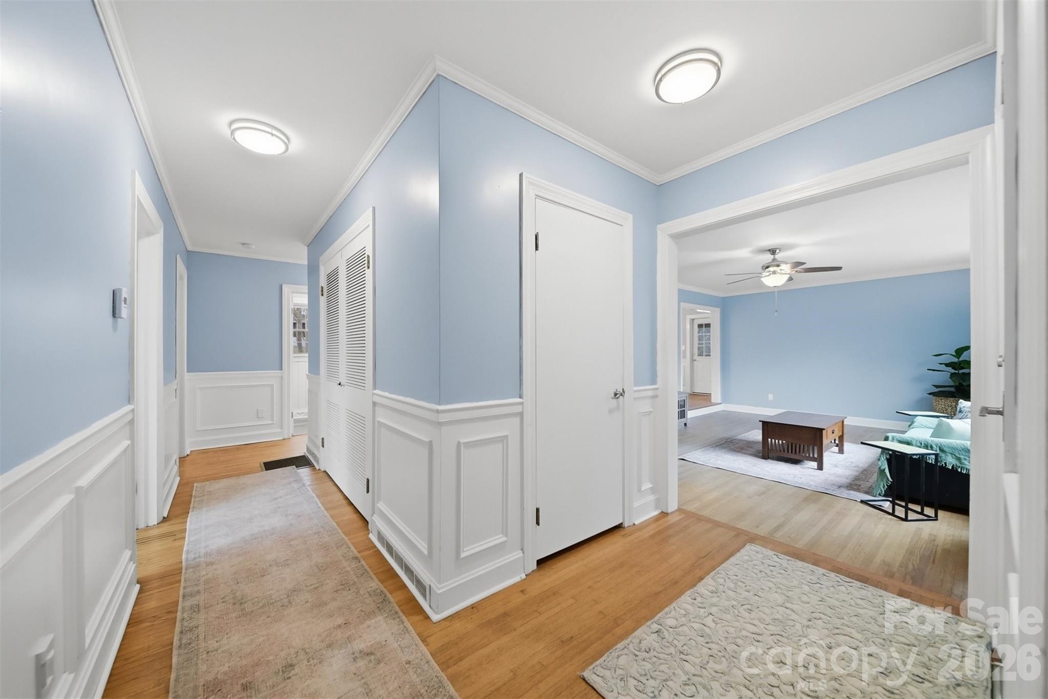 705 2nd Avenue Northeast Conover, NC 28613 - Photo 10 of 43 a bedroom with furniture and a wooden floor