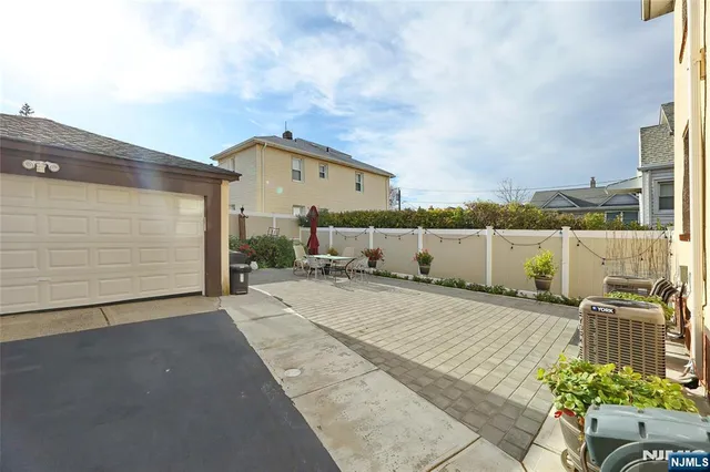 a view of a terrace with yard