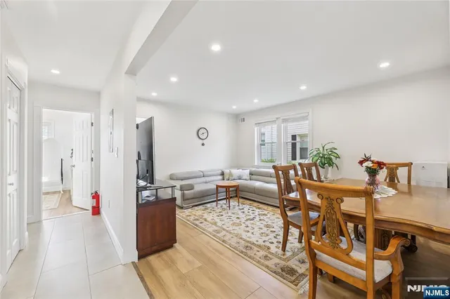 a living room with furniture and a table