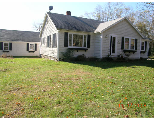 38 Gault Road Wareham, MA 02576 - Photo 1 of 6 a front view of a house with garden