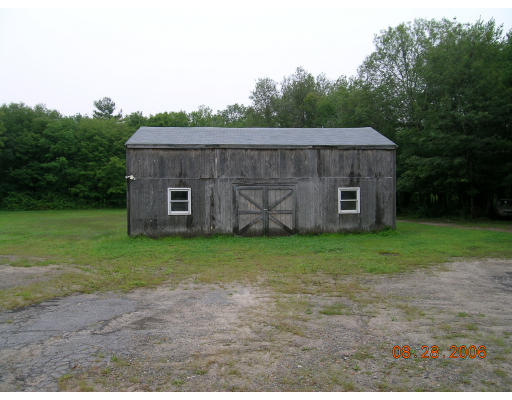 38 Gault Road Wareham, MA 02576 - Photo 4 of 6 a view of a tiny house with a yard