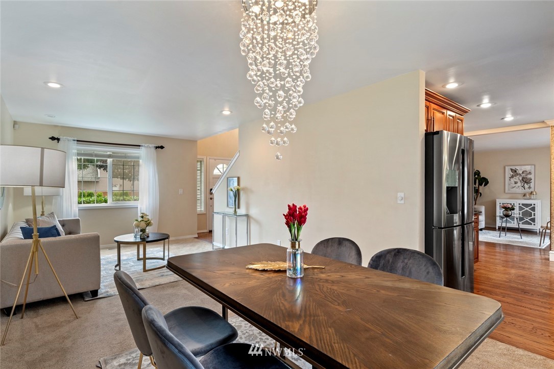 23100 14th Drive Southeast Bothell, WA 98021 - Photo 5 of 30 a dining room with furniture and wooden floor
