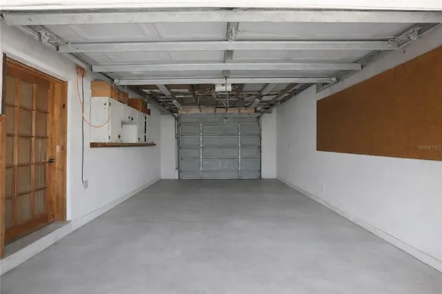 a view of a livingroom with furniture and a fireplace