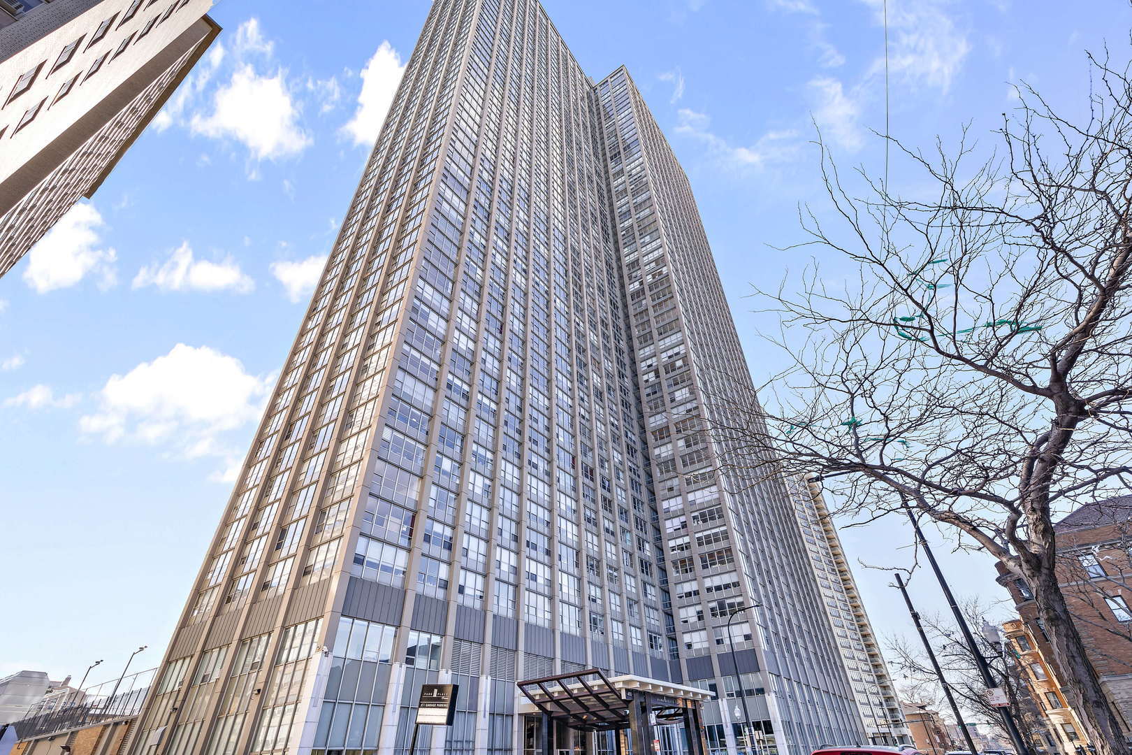 655 West Irving Park Road, Unit 1807 Chicago, IL 60613 - Photo 1 of 23 a view of a tall building