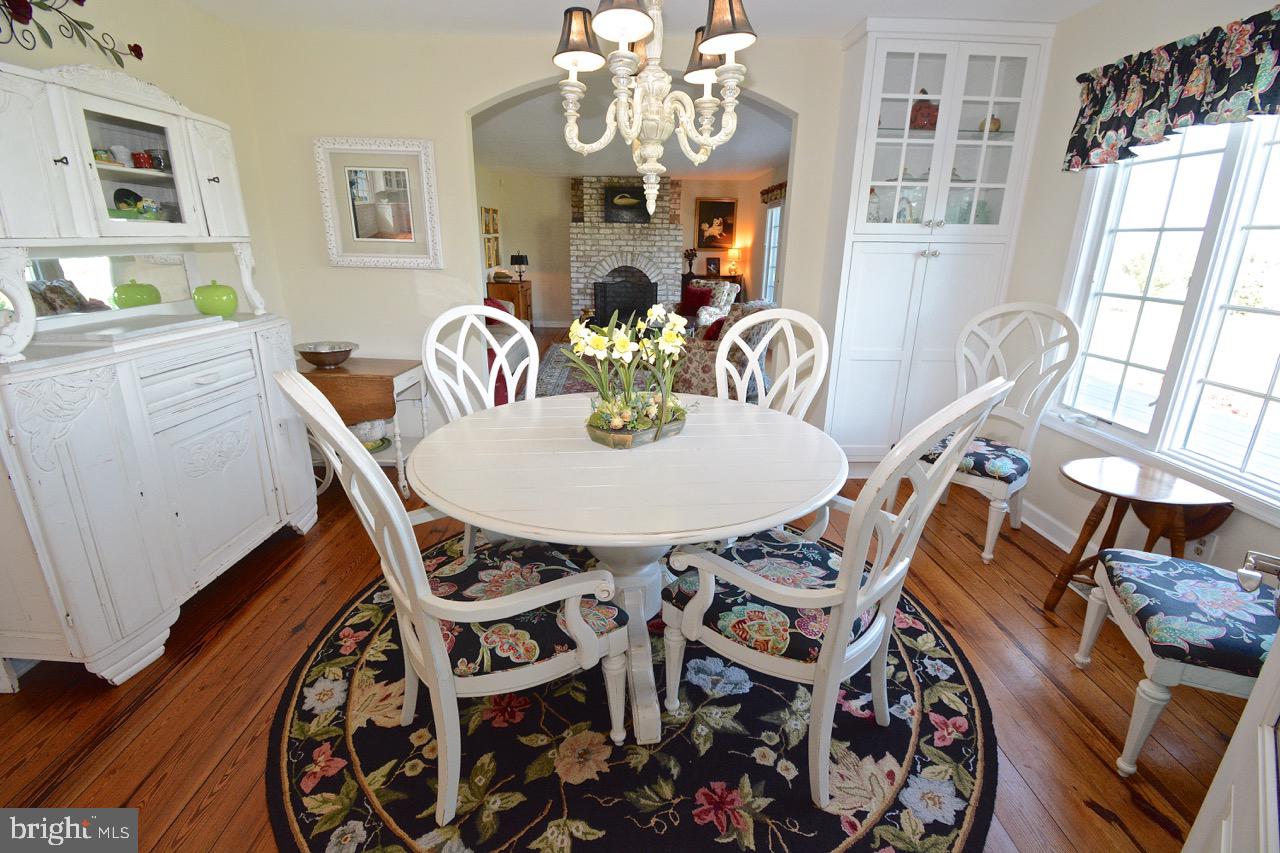 1669 Town Point Road Cambridge, MD 21613 - Photo 28 of 59 Breakfast Room with Living Room in Background