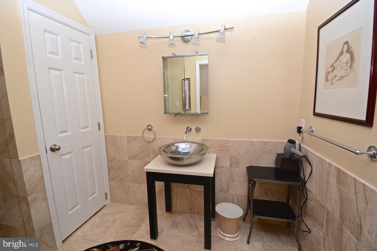 1669 Town Point Road Cambridge, MD 21613 - Photo 55 of 59 Apartment Bathroom with Marble Shower