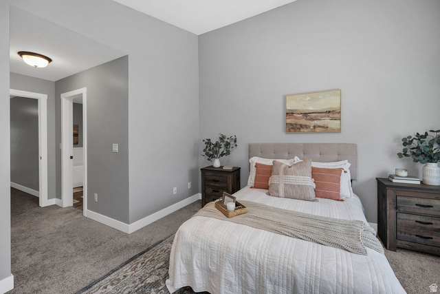 2483 South 1296th Street West Logan, UT 84321 - Photo 20 of 45 Carpeted room featuring light gray walls, white baseboards, and white door frames