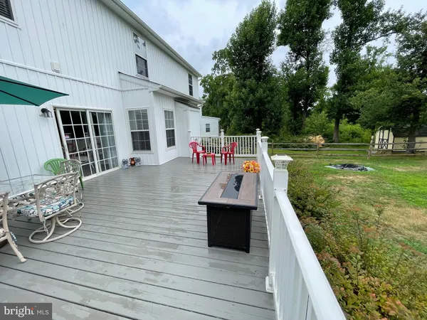 a view of outdoor space yard deck patio and outdoor kitchen