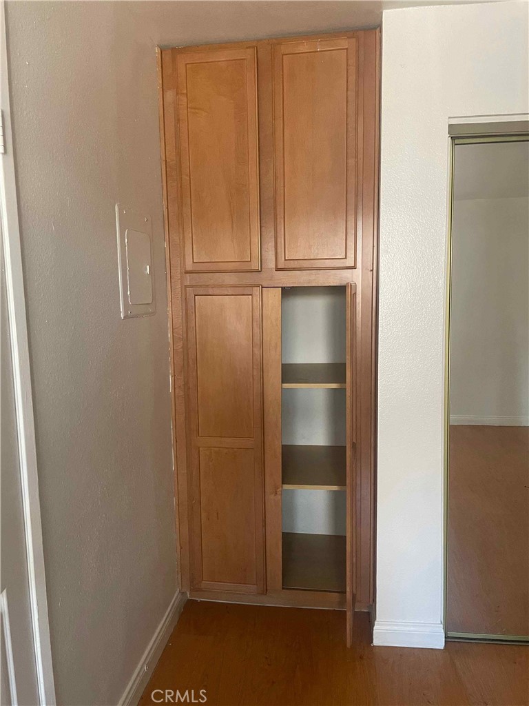 1315 Massachusetts Avenue, Unit 101 Riverside, CA 92507 - Photo 8 of 11 a bathroom with a glass shower door