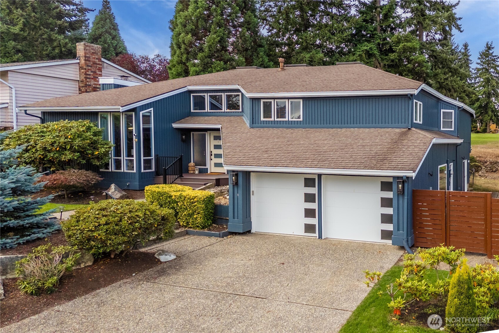 31611 37th Avenue Southwest Federal Way, WA 98023 - Photo 1 of 34 a front view of a house with garden