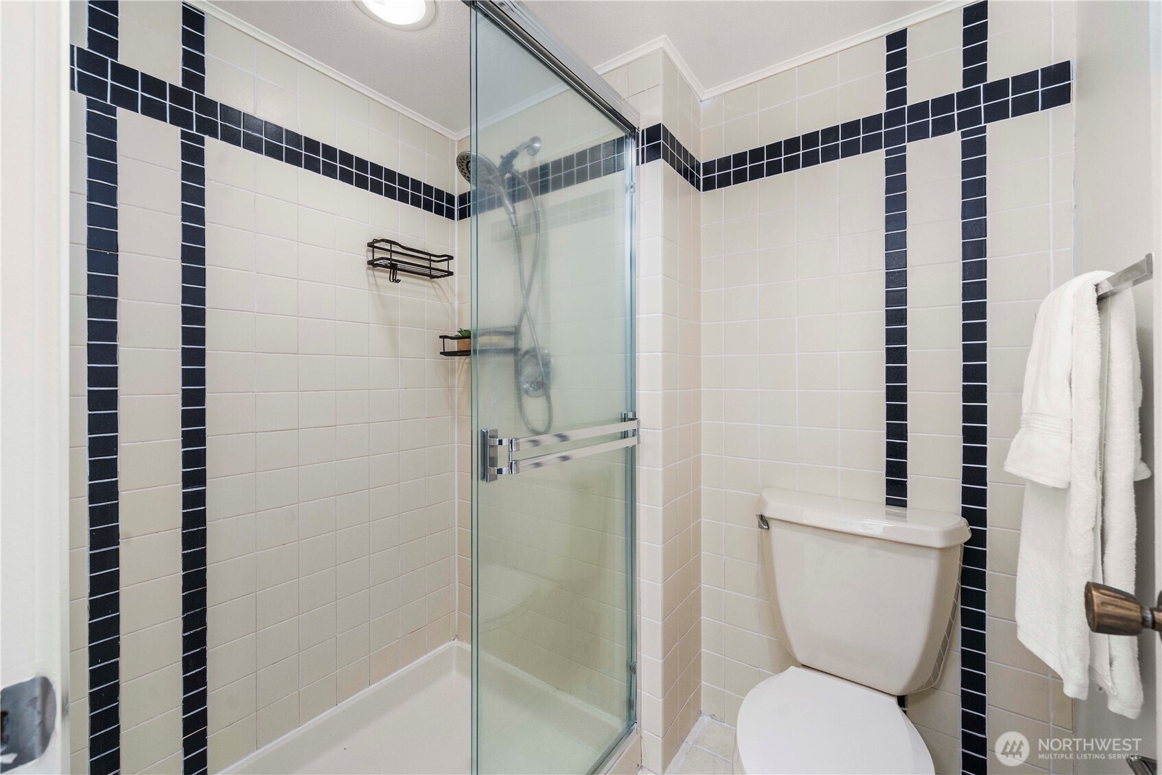 31611 37th Avenue Southwest Federal Way, WA 98023 - Photo 17 of 34 a bathroom with a shower a toilet and a shower