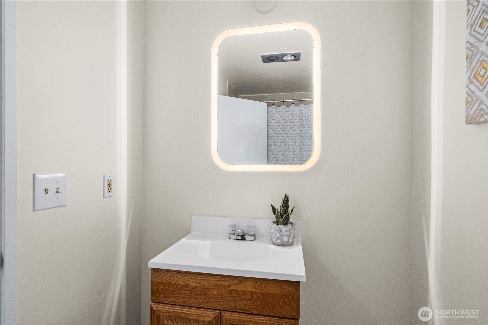 31611 37th Avenue Southwest Federal Way, WA 98023 - Photo 28 of 34 a bathroom with a sink and a mirror