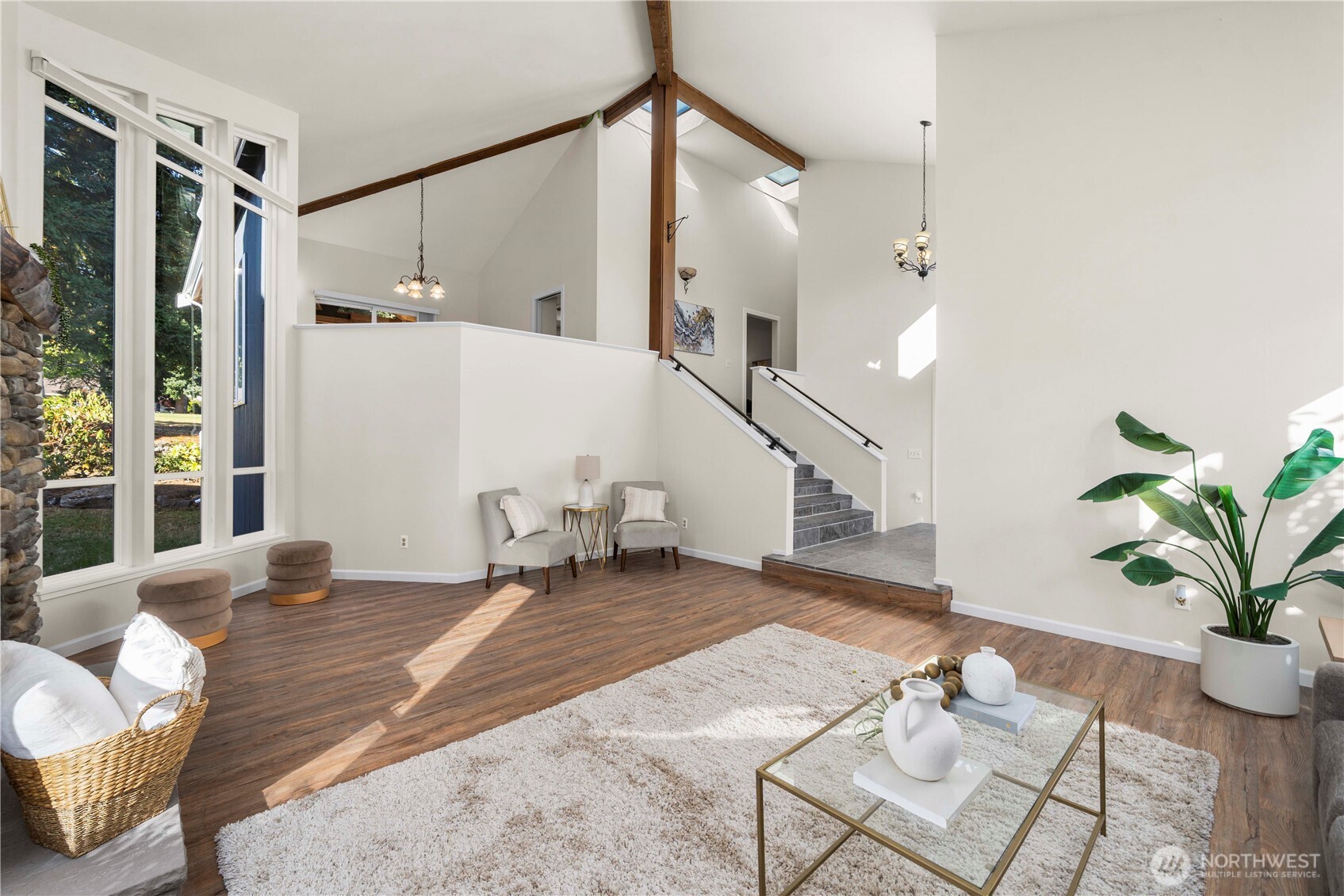 31611 37th Avenue Southwest Federal Way, WA 98023 - Photo 6 of 34 a bedroom with furniture and a potted plant