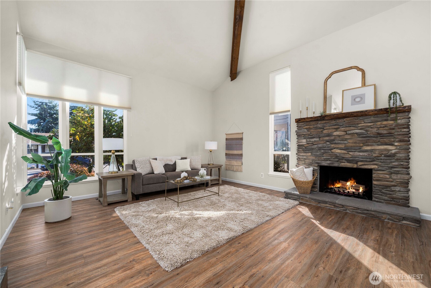 31611 37th Avenue Southwest Federal Way, WA 98023 - Photo 7 of 34 a living room with furniture and a fireplace