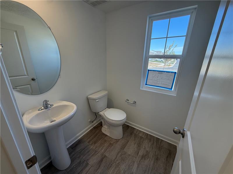 4005 Chakeres Avenue Springfield, OH 45505 - Photo 3 of 19 This bright bathroom features ample natural light and clean lines.