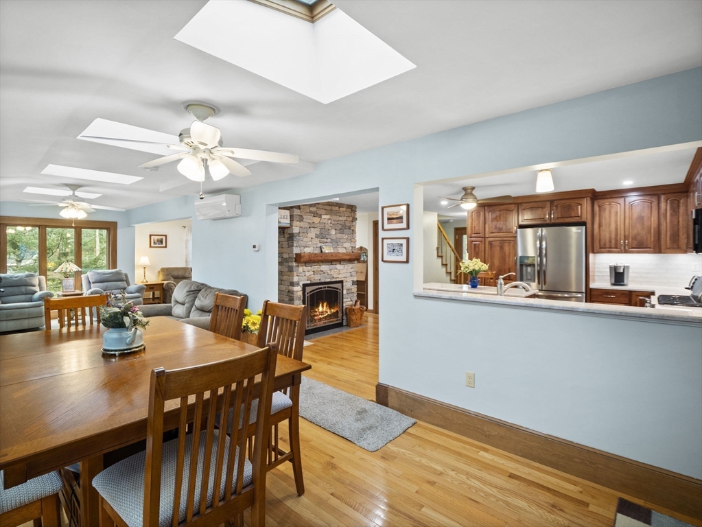 16 Blueberry Road Ashburnham, MA 01430 - Photo 12 of 42 a dining room with stainless steel appliances a table and chairs