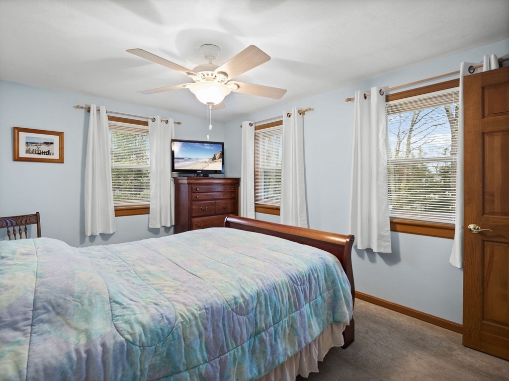 16 Blueberry Road Ashburnham, MA 01430 - Photo 17 of 42 a bedroom with a large bed and a window