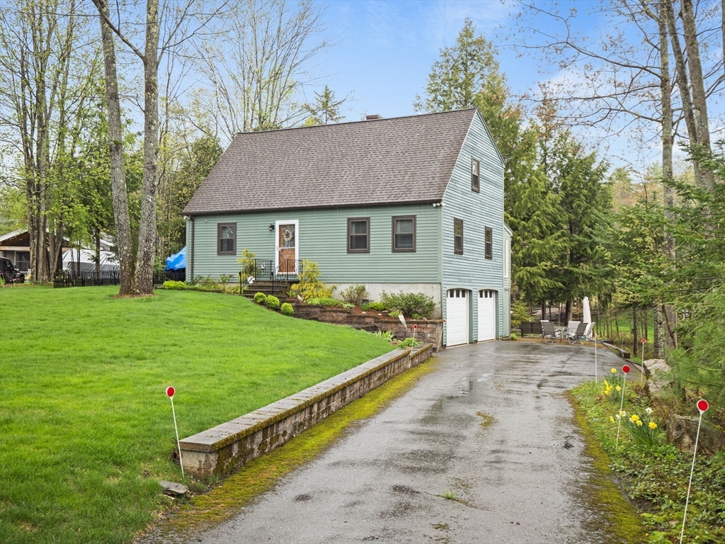 16 Blueberry Road Ashburnham, MA 01430 - Photo 42 of 42 a front view of house with yard and green space
