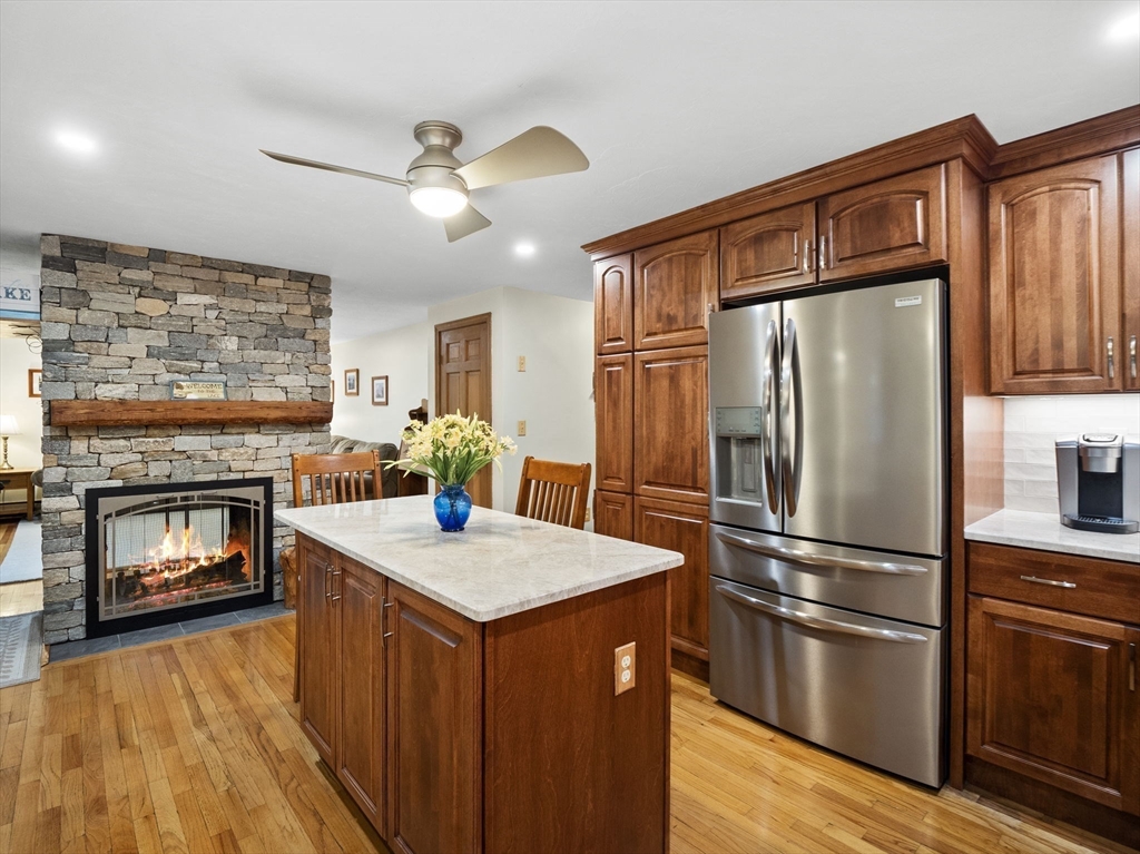 16 Blueberry Road Ashburnham, MA 01430 - Photo 6 of 42 a kitchen with stainless steel appliances granite countertop a refrigerator a stove a sink and a refrigerator