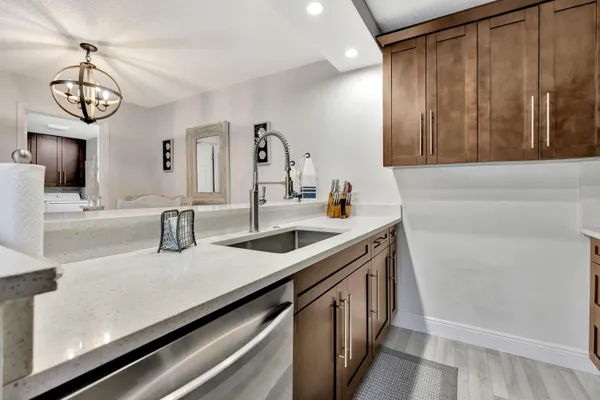 a bathroom with a sink and a large mirror