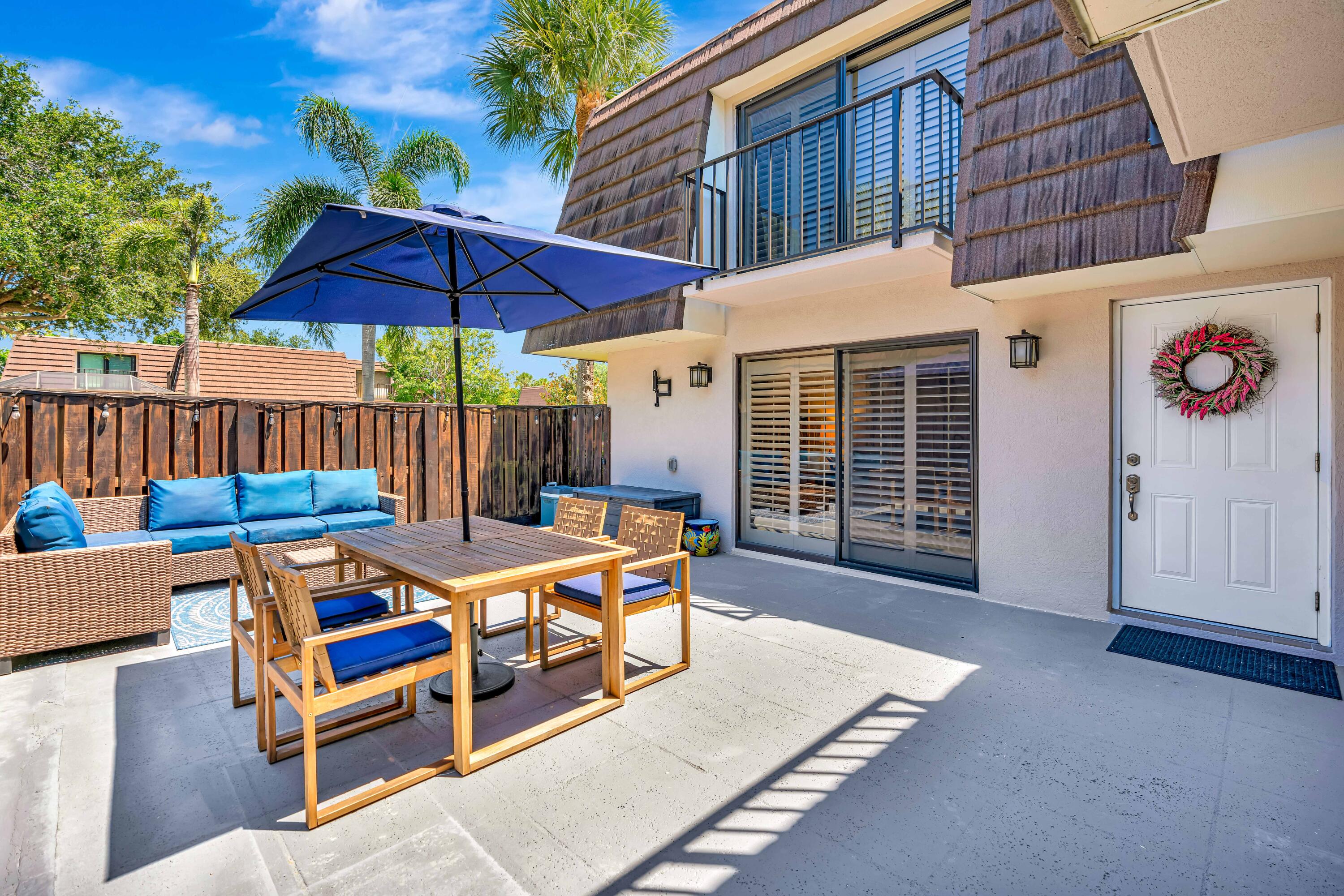 1209 12th Court Jupiter, FL 33477 - Photo 27 of 31 a outdoor view with sitting space