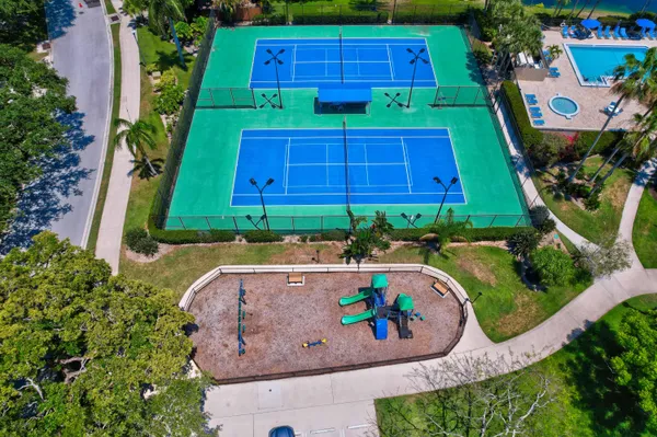 an outdoor view with swimming pool and outdoor seating