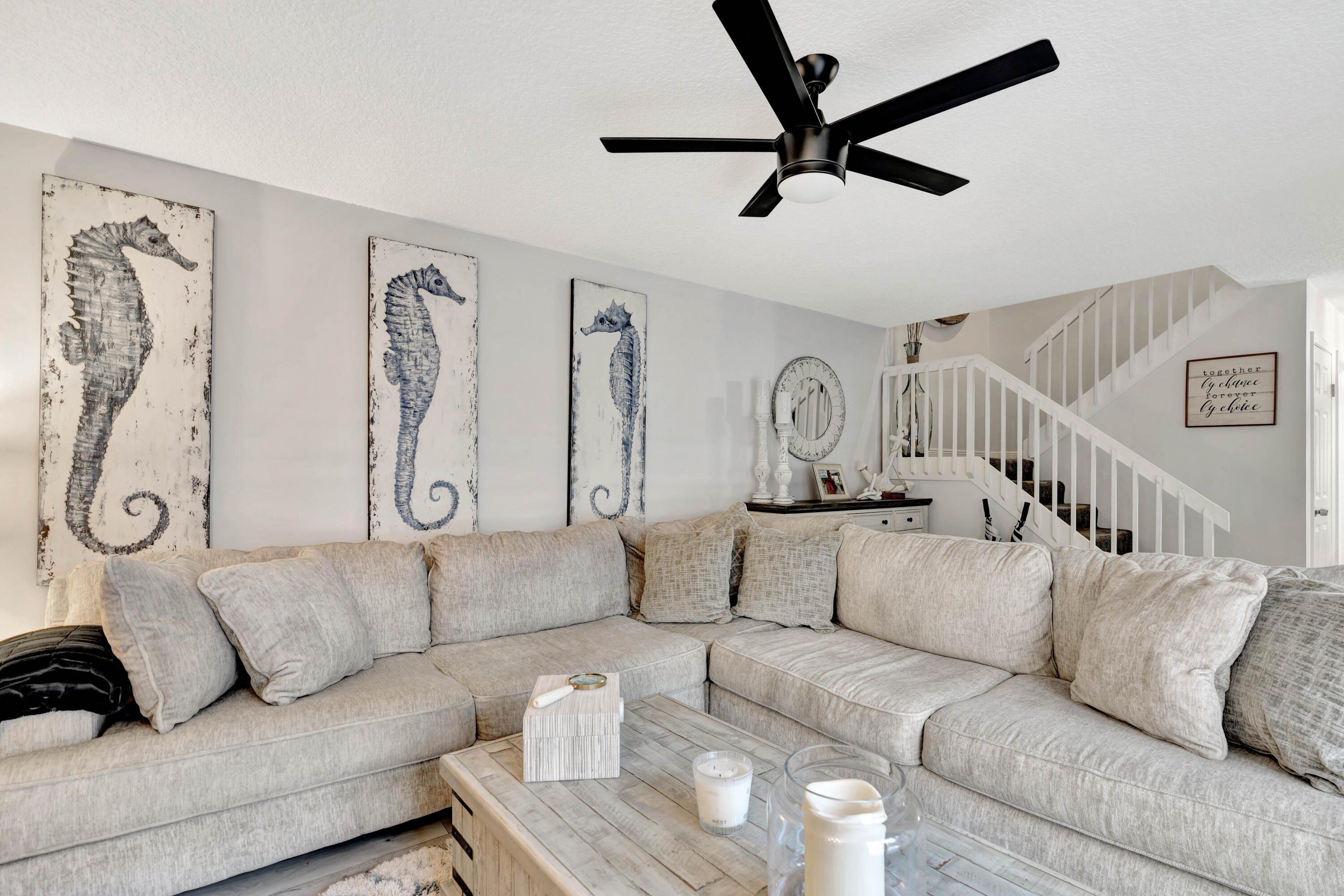 1209 12th Court Jupiter, FL 33477 - Photo 5 of 31 a living room with furniture and a ceiling fan