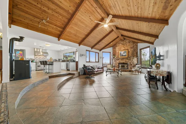 a lobby with furniture and a view of living room