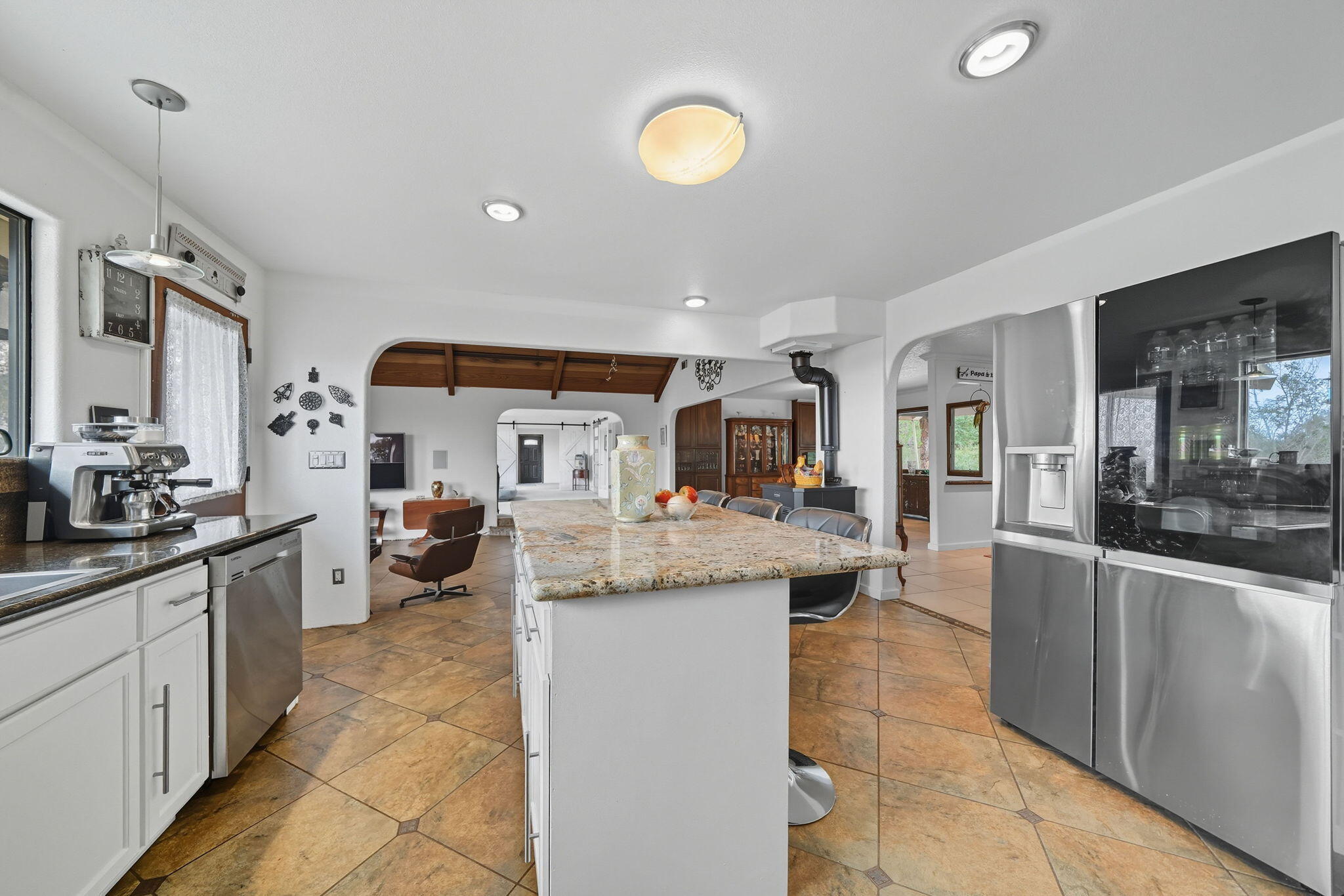 28382 Alpine Way Shingletown, CA 96088 - Photo 12 of 45 a kitchen with sink stove and cabinets