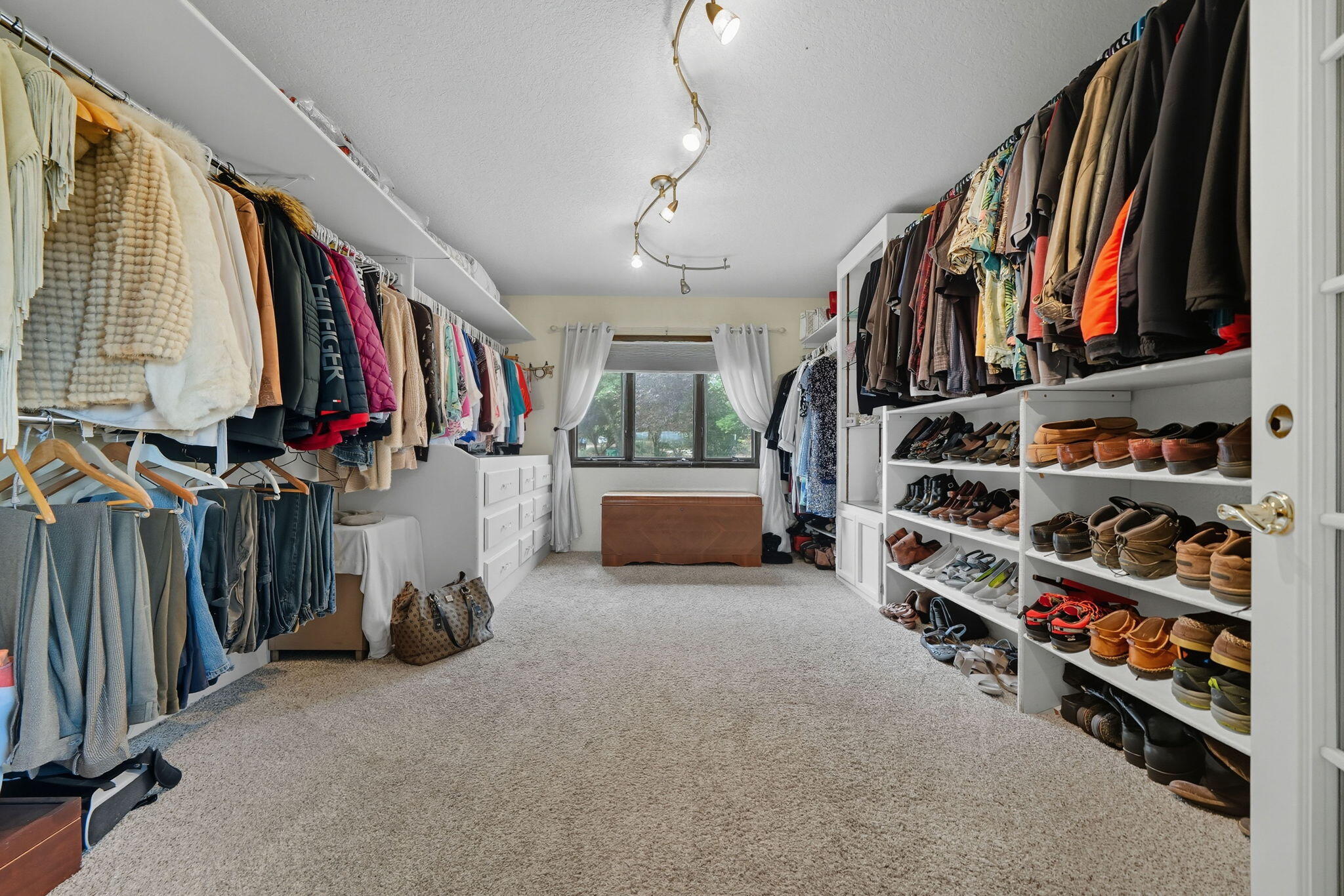 28382 Alpine Way Shingletown, CA 96088 - Photo 30 of 45 a view of walk in closet with clothes and shoes