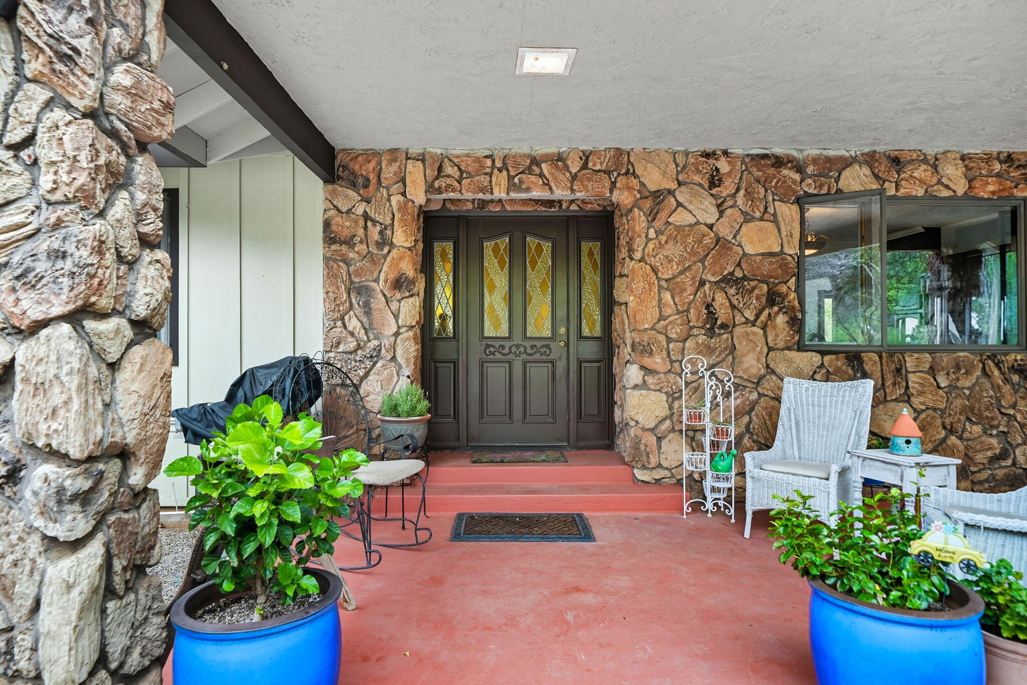 28382 Alpine Way Shingletown, CA 96088 - Photo 3 of 45 a front view of a house with potted plants