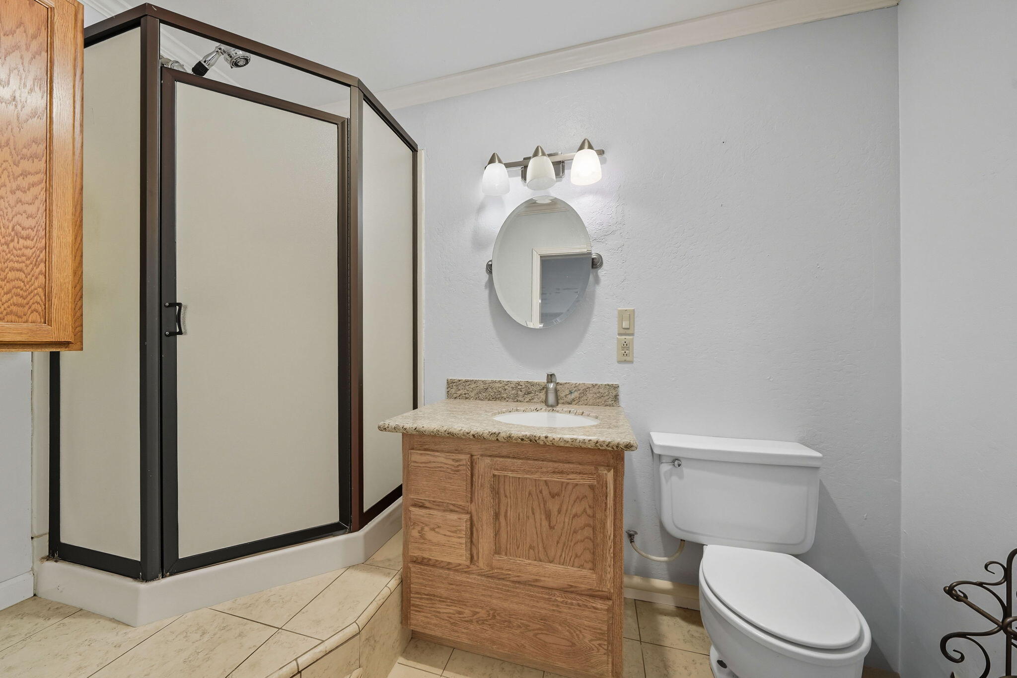 28382 Alpine Way Shingletown, CA 96088 - Photo 39 of 45 a bathroom with a toilet a sink and mirror
