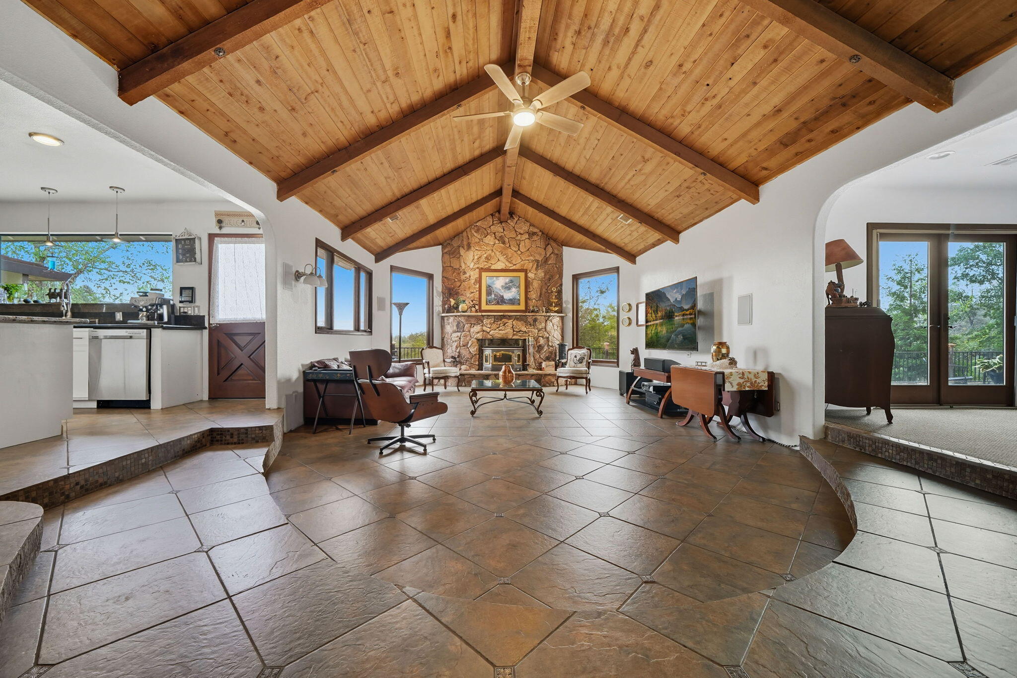 28382 Alpine Way Shingletown, CA 96088 - Photo 4 of 45 a living room with furniture a chandelier and a rug