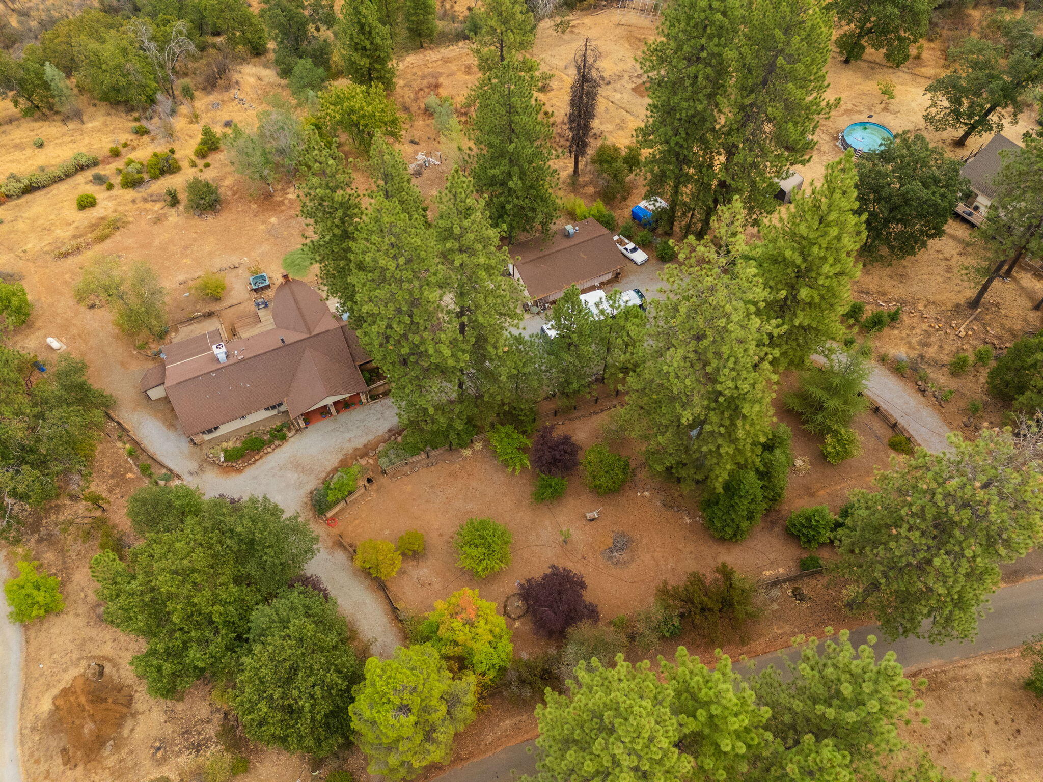 28382 Alpine Way Shingletown, CA 96088 - Photo 42 of 45 an aerial view of residential house with outdoor space