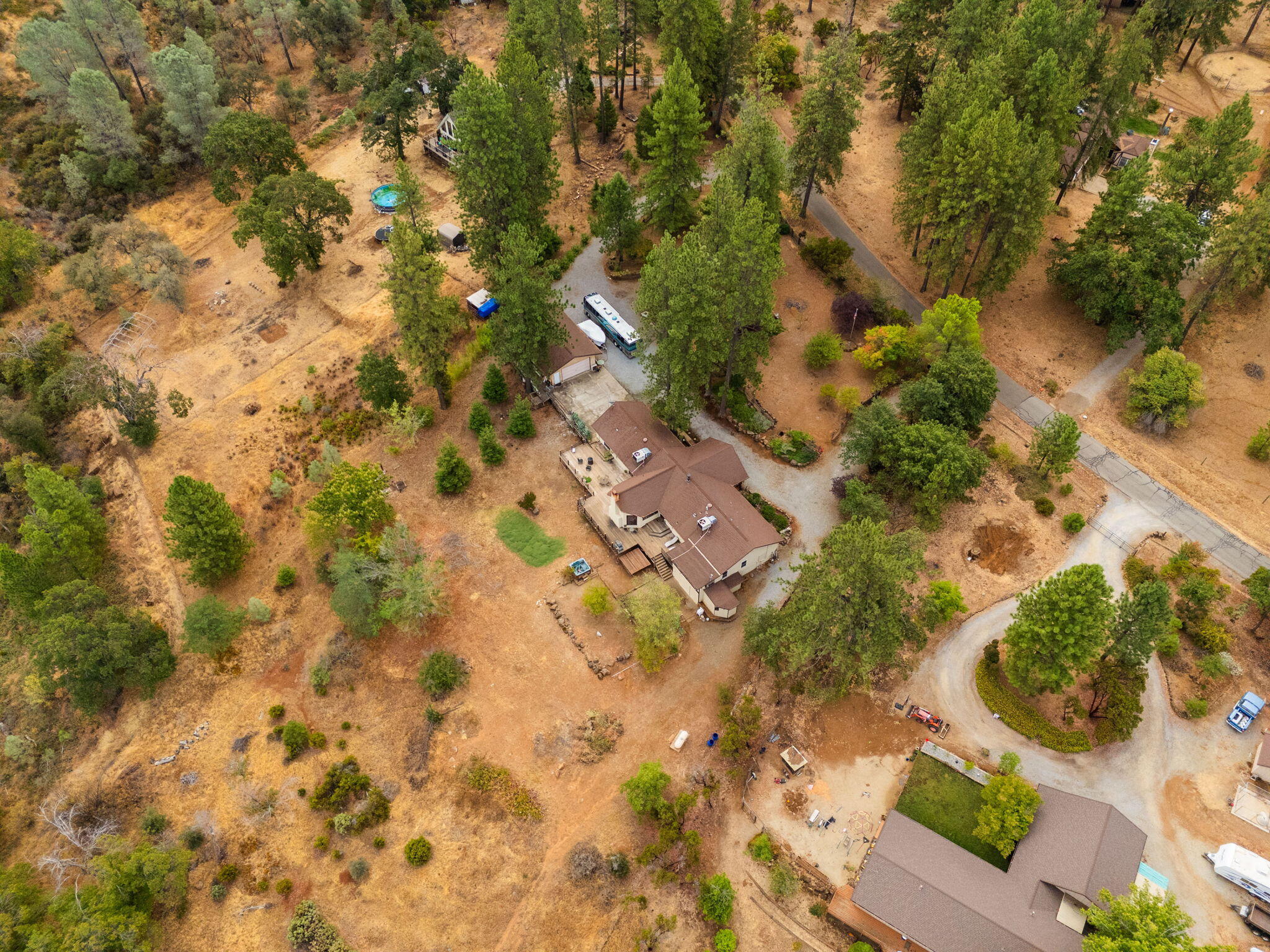 28382 Alpine Way Shingletown, CA 96088 - Photo 43 of 45 an aerial view of residential house with parking space