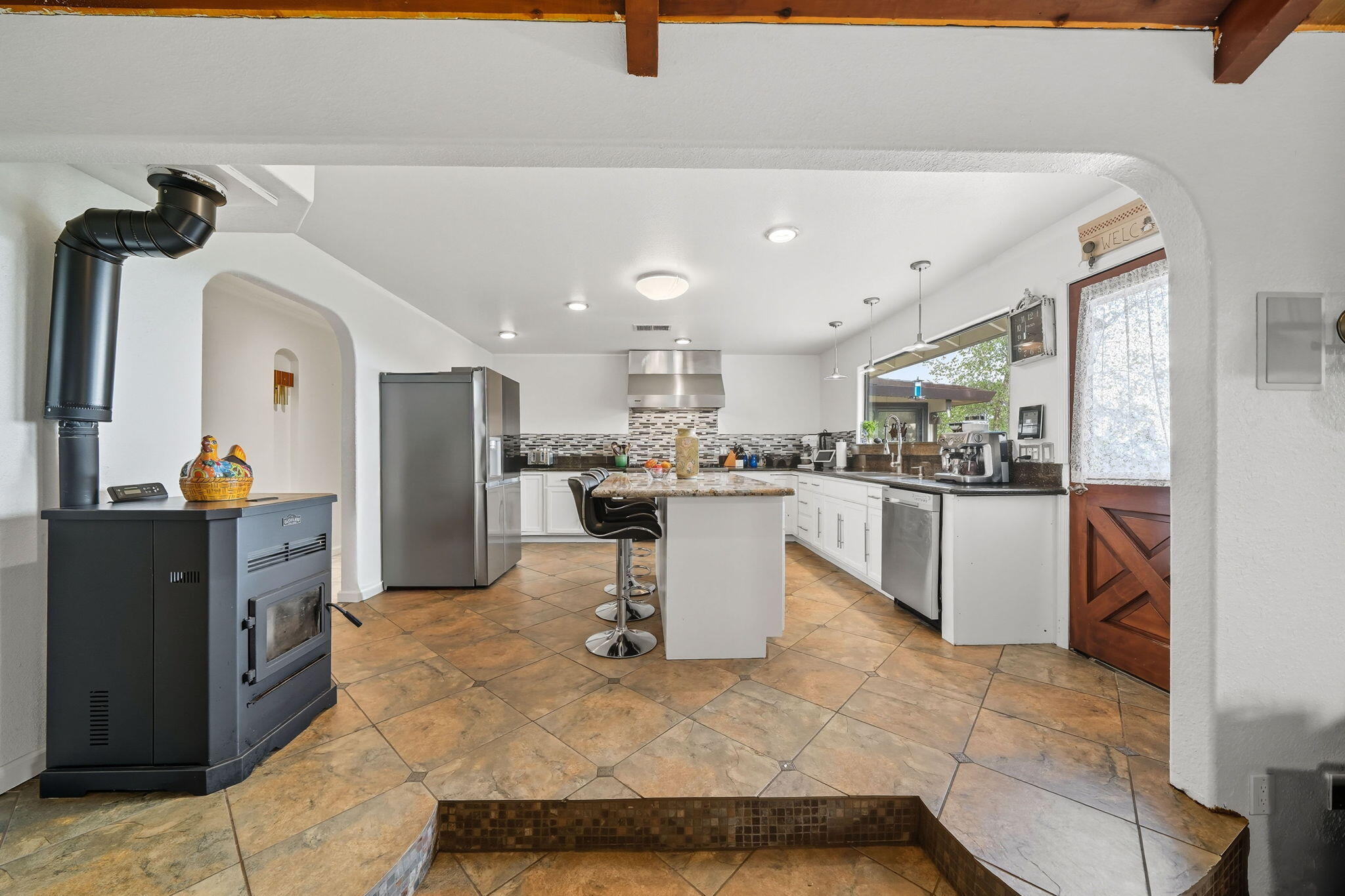 28382 Alpine Way Shingletown, CA 96088 - Photo 8 of 45 a kitchen with a refrigerator and a sink