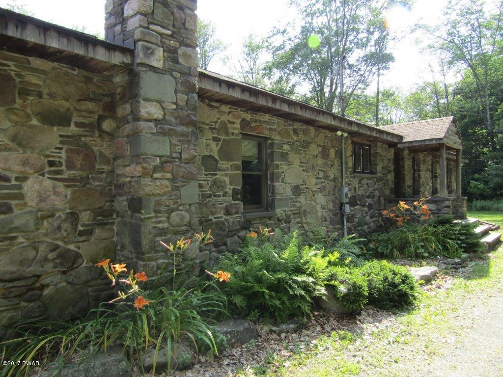 227 Hemlock Grove Road Newfoundland, PA 18445 - Photo 3 of 49 a backyard of a house