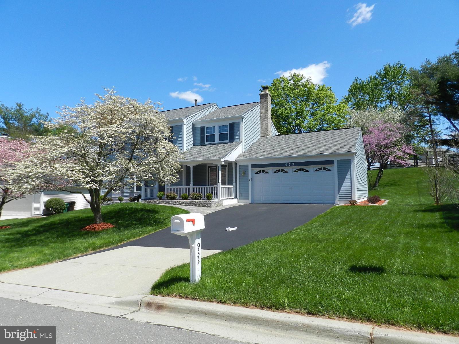 932 Pointer Ridge Drive Gaithersburg, MD 20878 - Photo 3 of 29 a front view of house with yard and green space