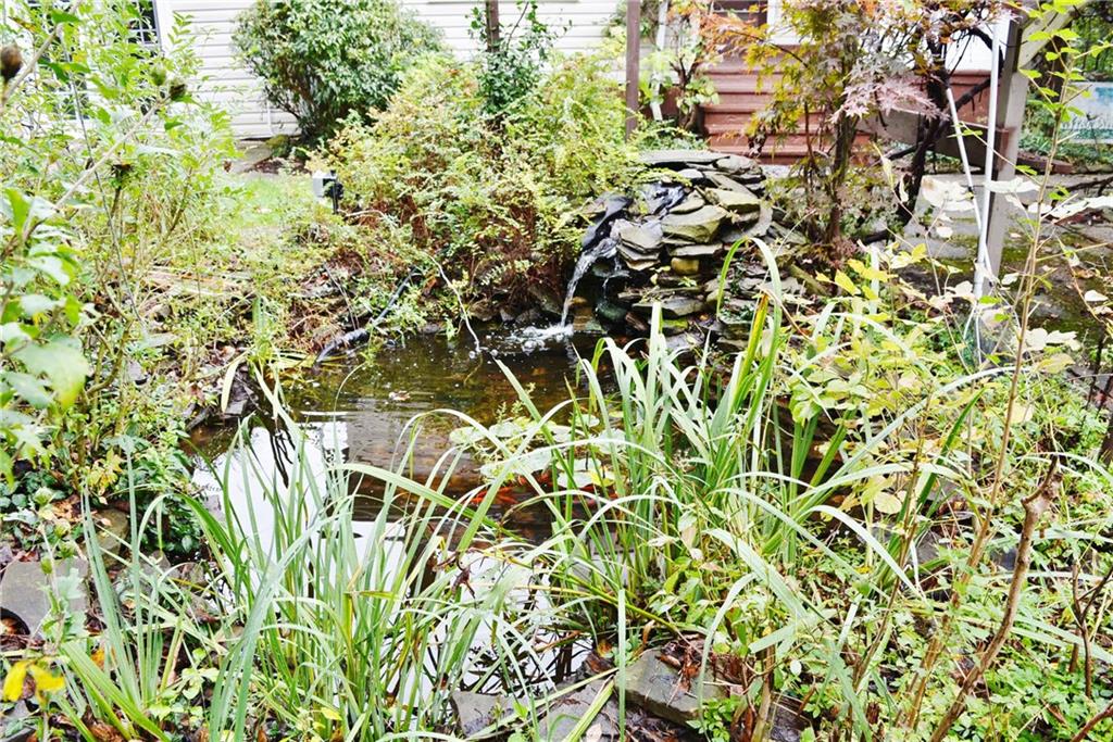 1200 Anderson Road Pittsburgh, PA 15209 - Photo 24 of 25 Water feature includes waterfall, small pond and pretty little fishes!
