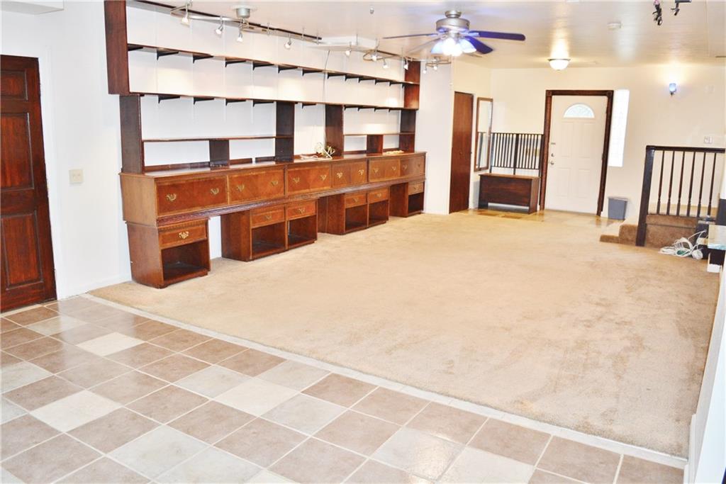 1200 Anderson Road Pittsburgh, PA 15209 - Photo 7 of 25 Living room with loads of built in storage and shelves