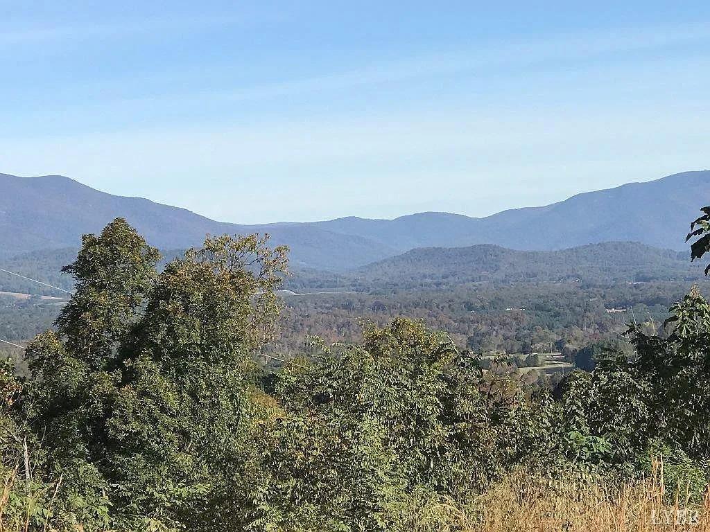 a view of mountains and valleys