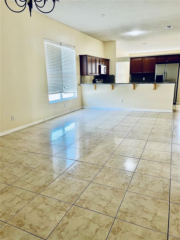 13367 Luxbury Loop Orlando, FL 32837 - Photo 13 of 49 a view of kitchen and window