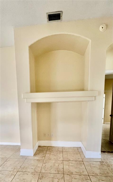 13367 Luxbury Loop Orlando, FL 32837 - Photo 16 of 49 a view of walk in closet with empty room