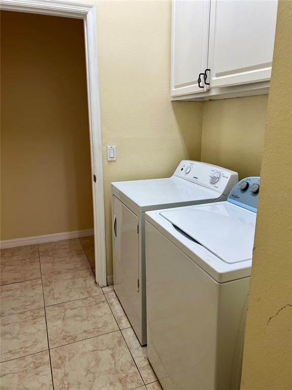 13367 Luxbury Loop Orlando, FL 32837 - Photo 44 of 49 a utility room with dryer and washer